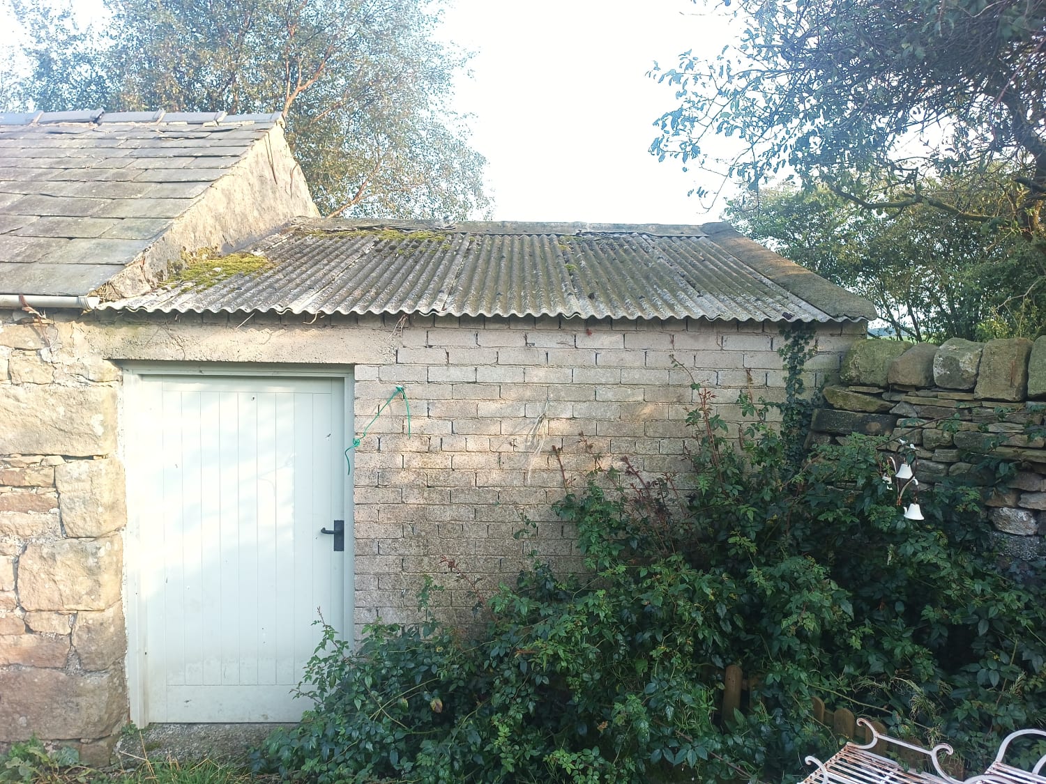 Removing chrysotile asbestos roof sheets from outbuildings in Settle