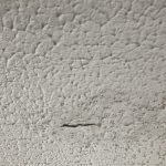 Removing asbestos textured ceiling coating in a kitchen in Bonnyrigg