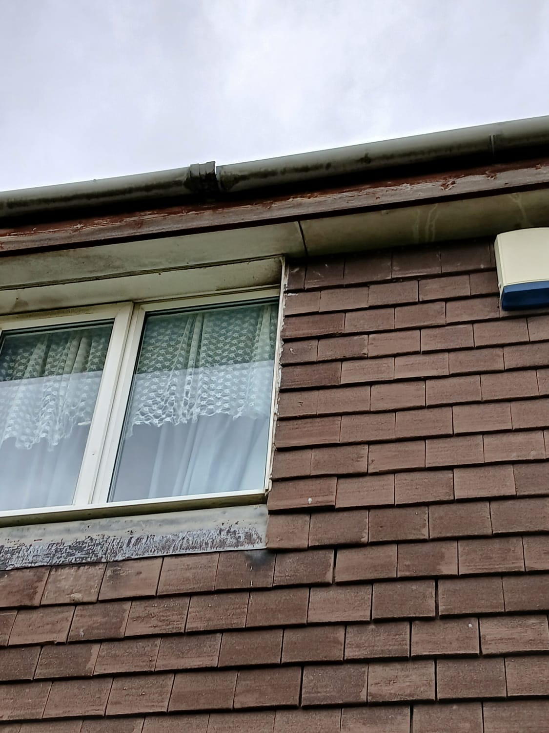 Repair cracked gutter joint on terraced house in Cramlington NE23