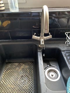 Fixing or replacing a leaking kitchen tap in Leicester