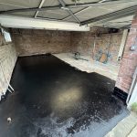 Safe removal of amosite and chrysotile asbestos from a garage ceiling in East Kilbride