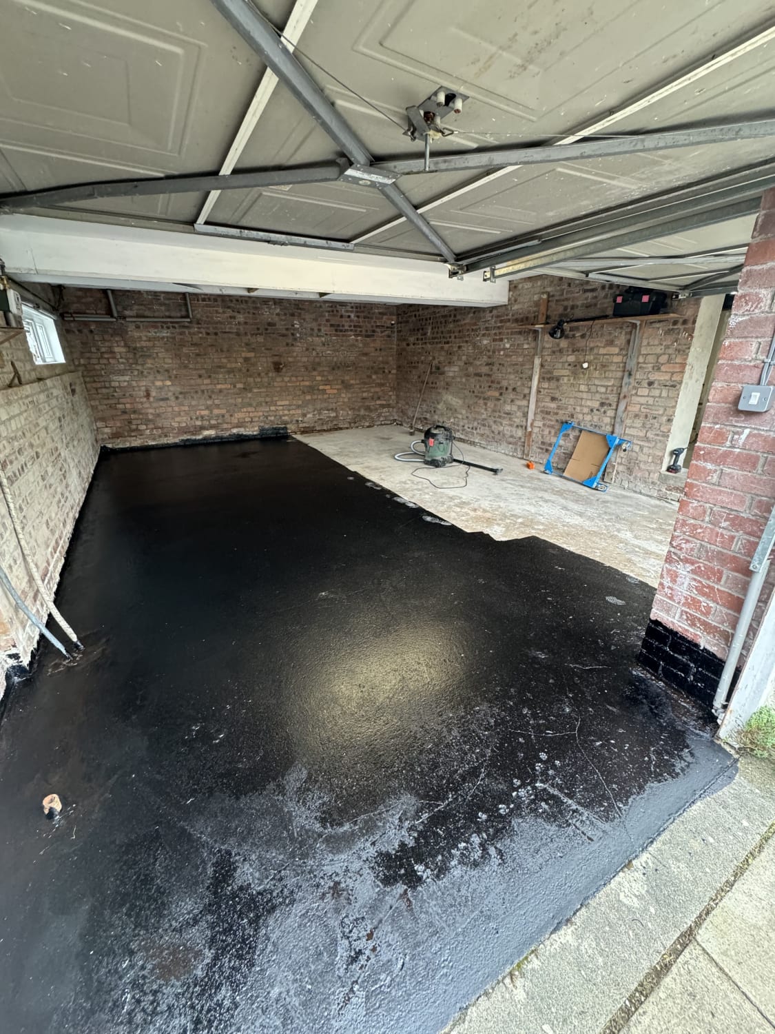 Safe removal of amosite and chrysotile asbestos from a garage ceiling in East Kilbride
