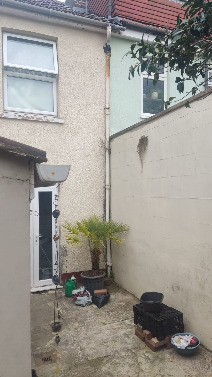 Replacing a damaged cast iron downpipe with uPVC in Bristol