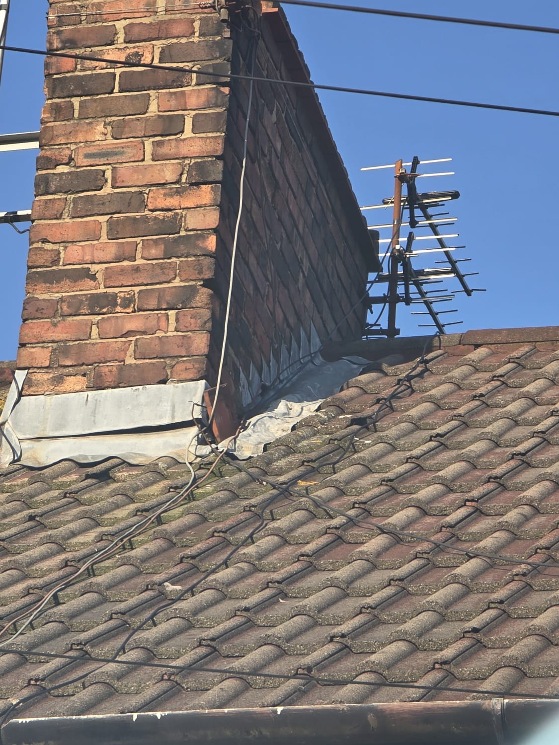 Fixing a chimney leak with flashing resealing in Liverpool