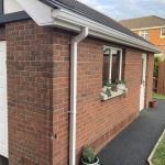 Replacement of rotten wooden fascia and soffits on a garage in Craigavon