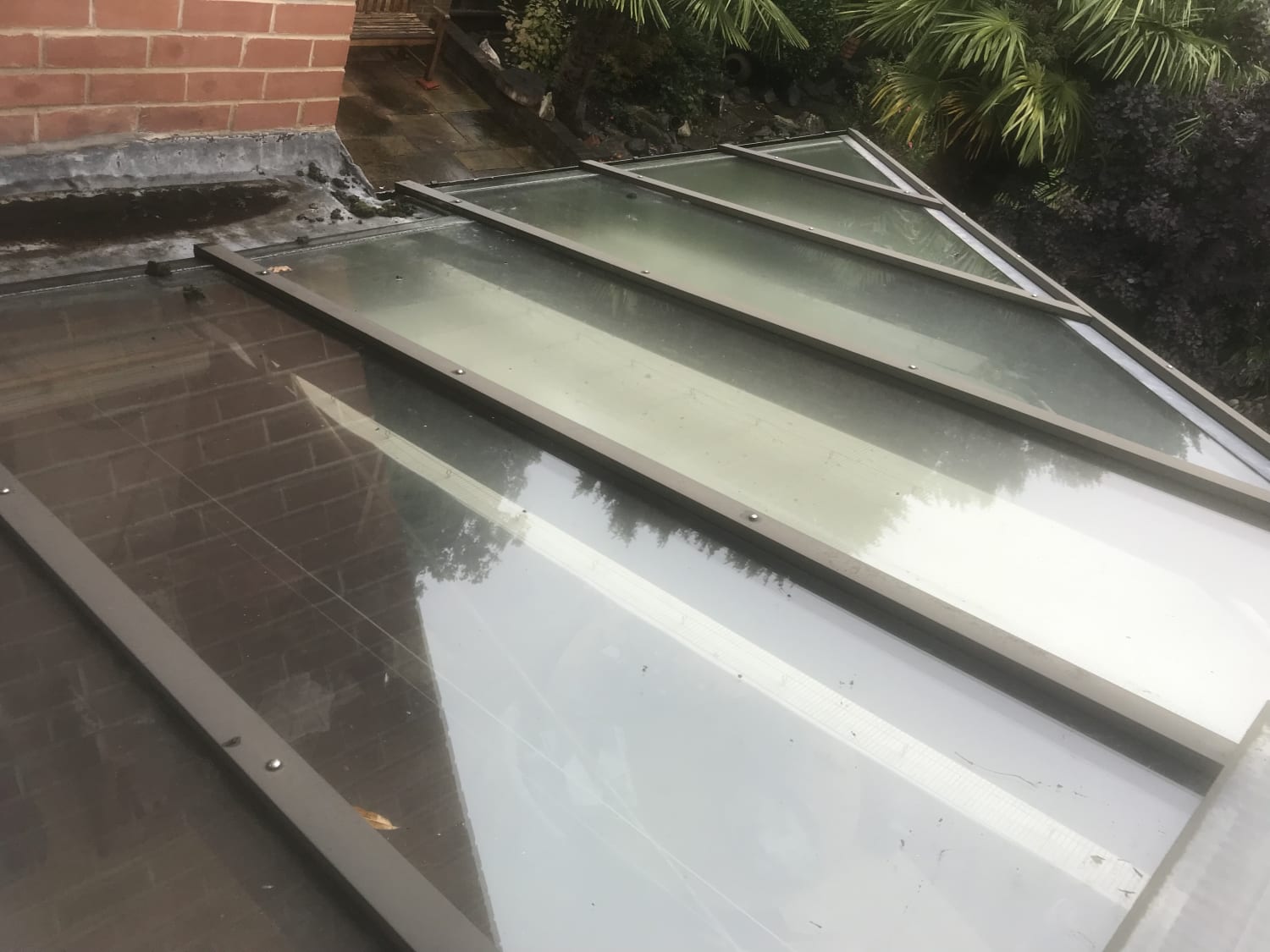 Fixing a conservatory roof leak near lead flashing in Derby