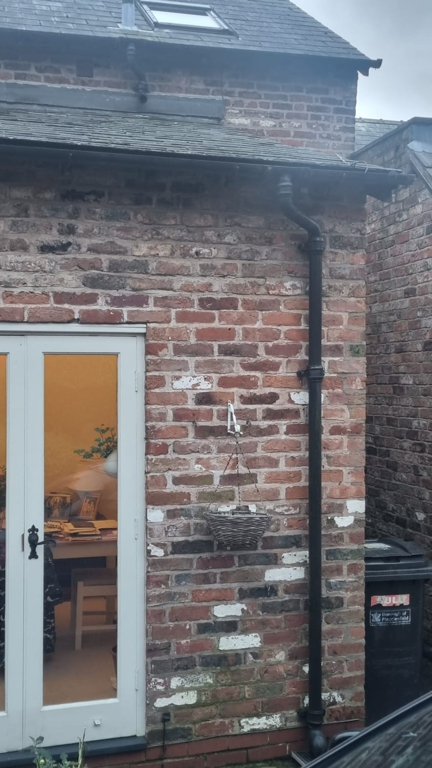 Replacement of leaking cast iron guttering with black UPVC in Knutsford