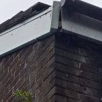 Tile and dry verge roof repairs with fascia board fixing in Manchester