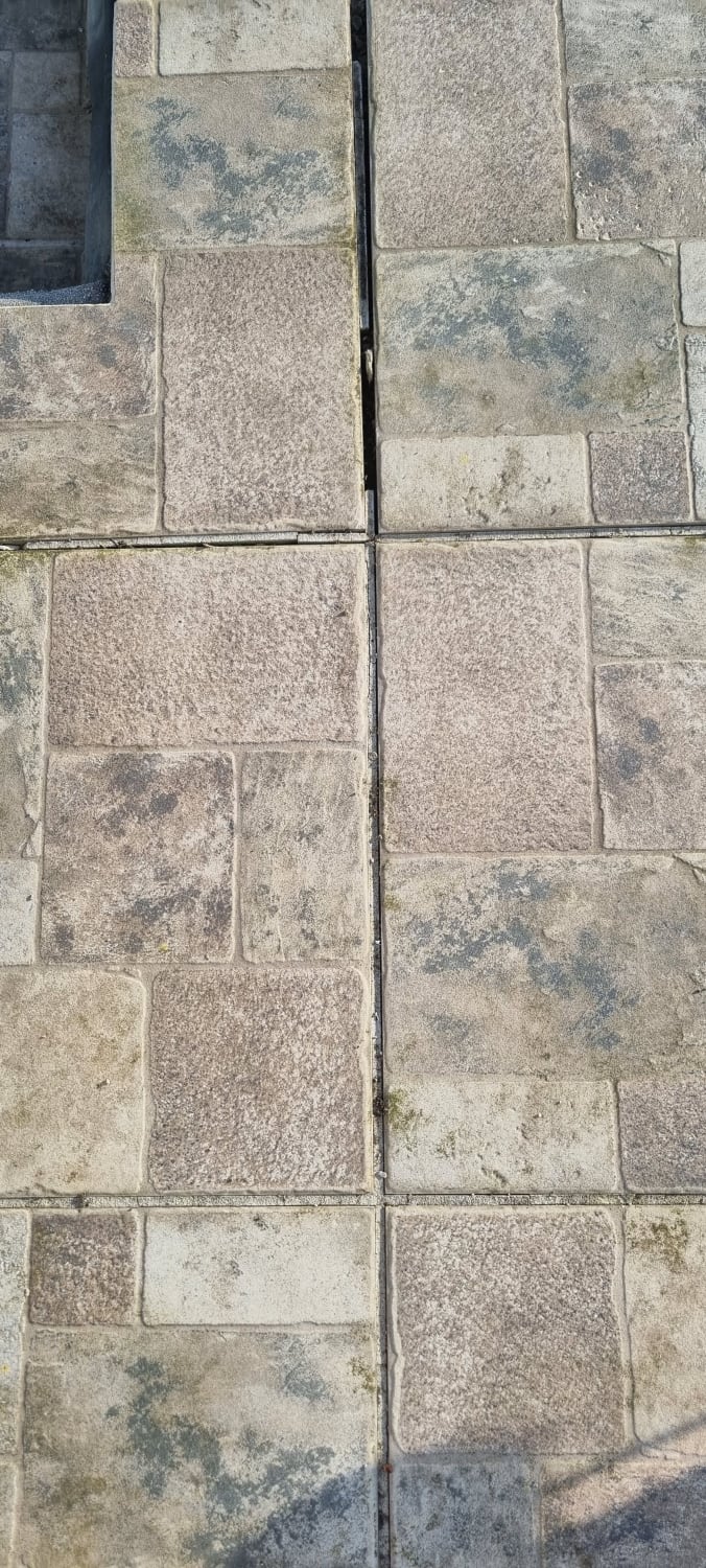 Re-grouting two external tiled patios in Plymouth