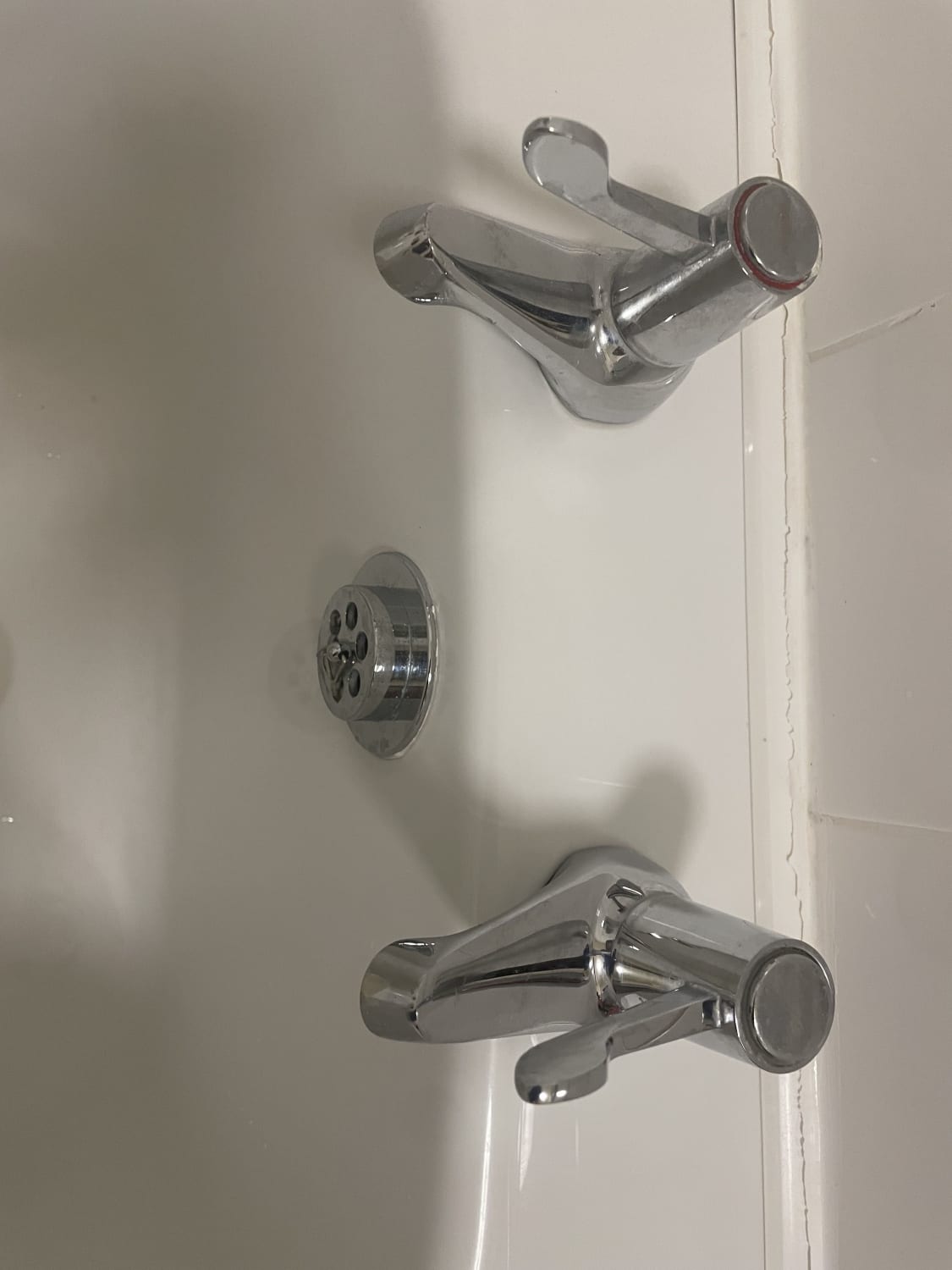 Installing a shower mixer for separate hot and cold taps in Chesterfield