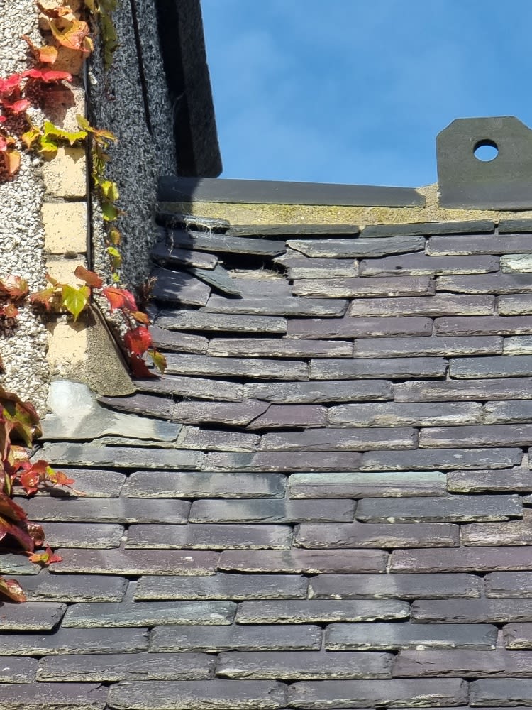 Replacing damaged slate tiles and improving ventilation in Peterhead