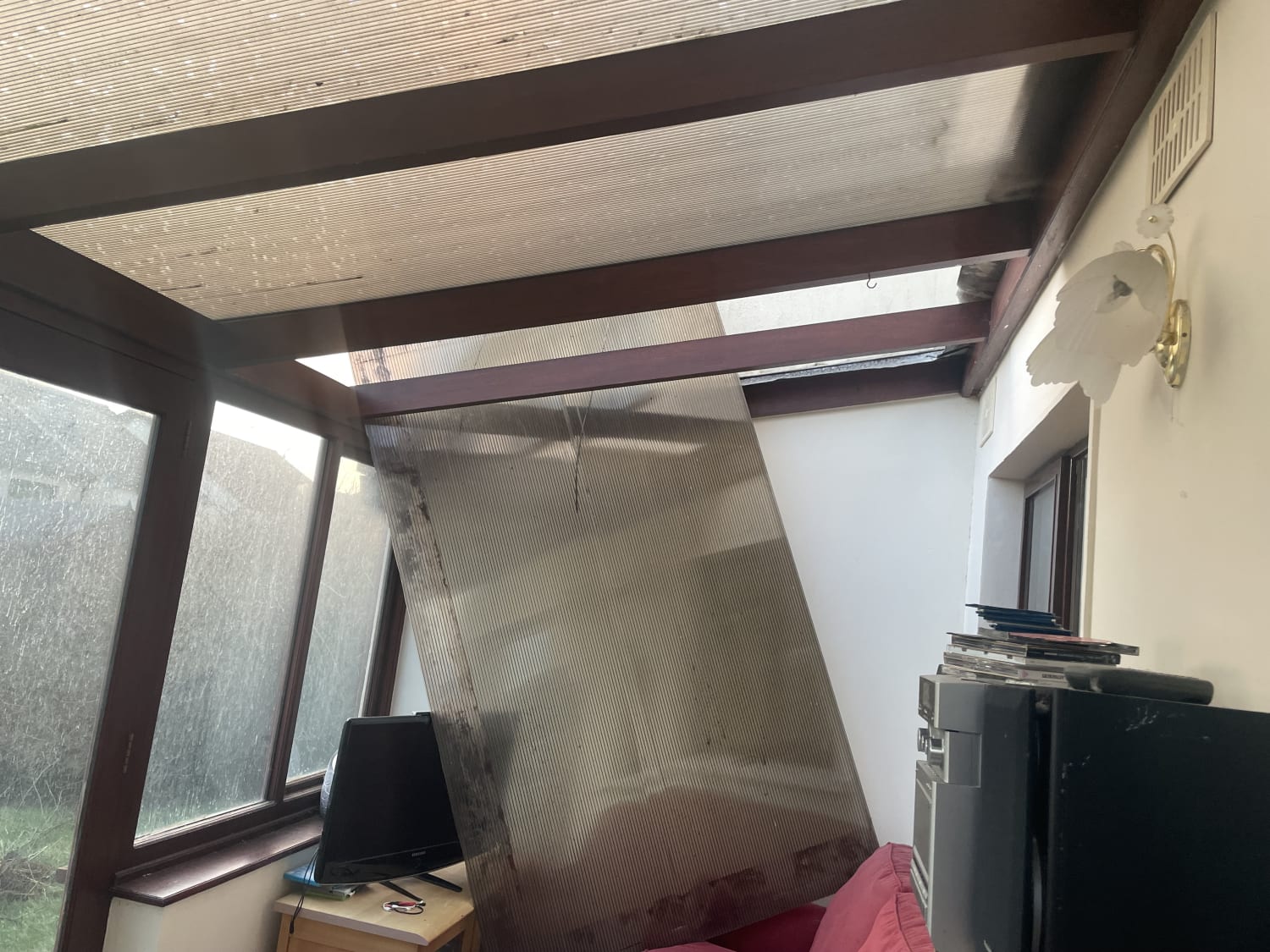 Urgent polycarbonate roof panel replacement in Isle of Man