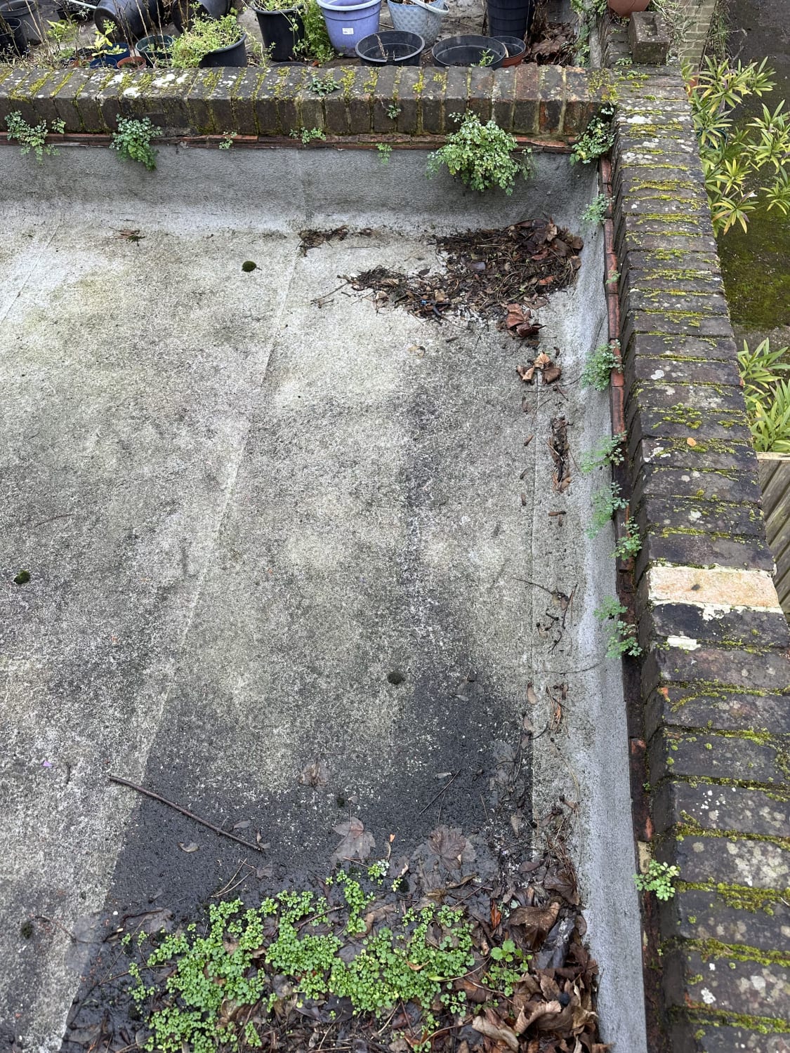 Leaking flat roof repair for detached brick garage in London SW19