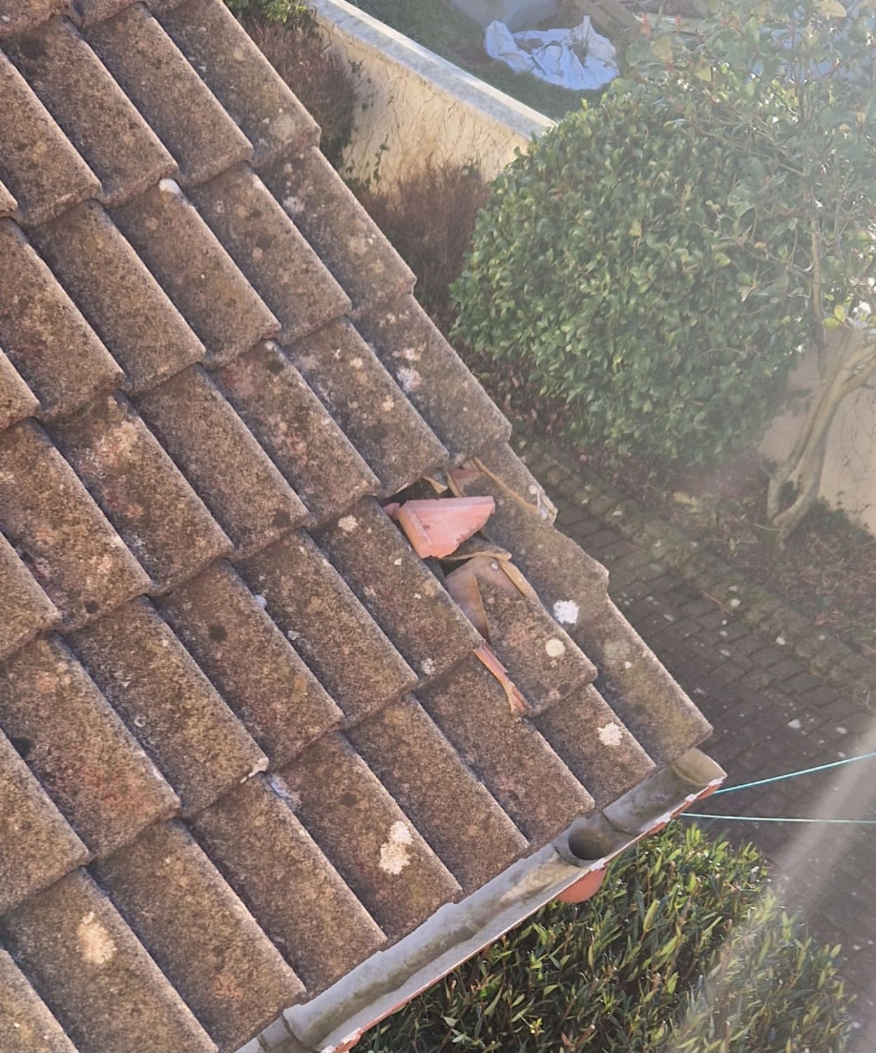 Storm damaged clay roof tile repair in Downpatrick