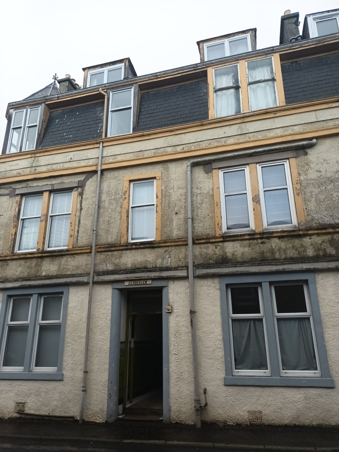 Slate roof repair after storm damage in Greenock