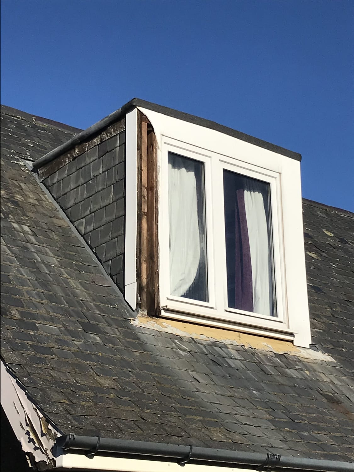 Storm damage repair and full tile roof replacement in Edinburgh